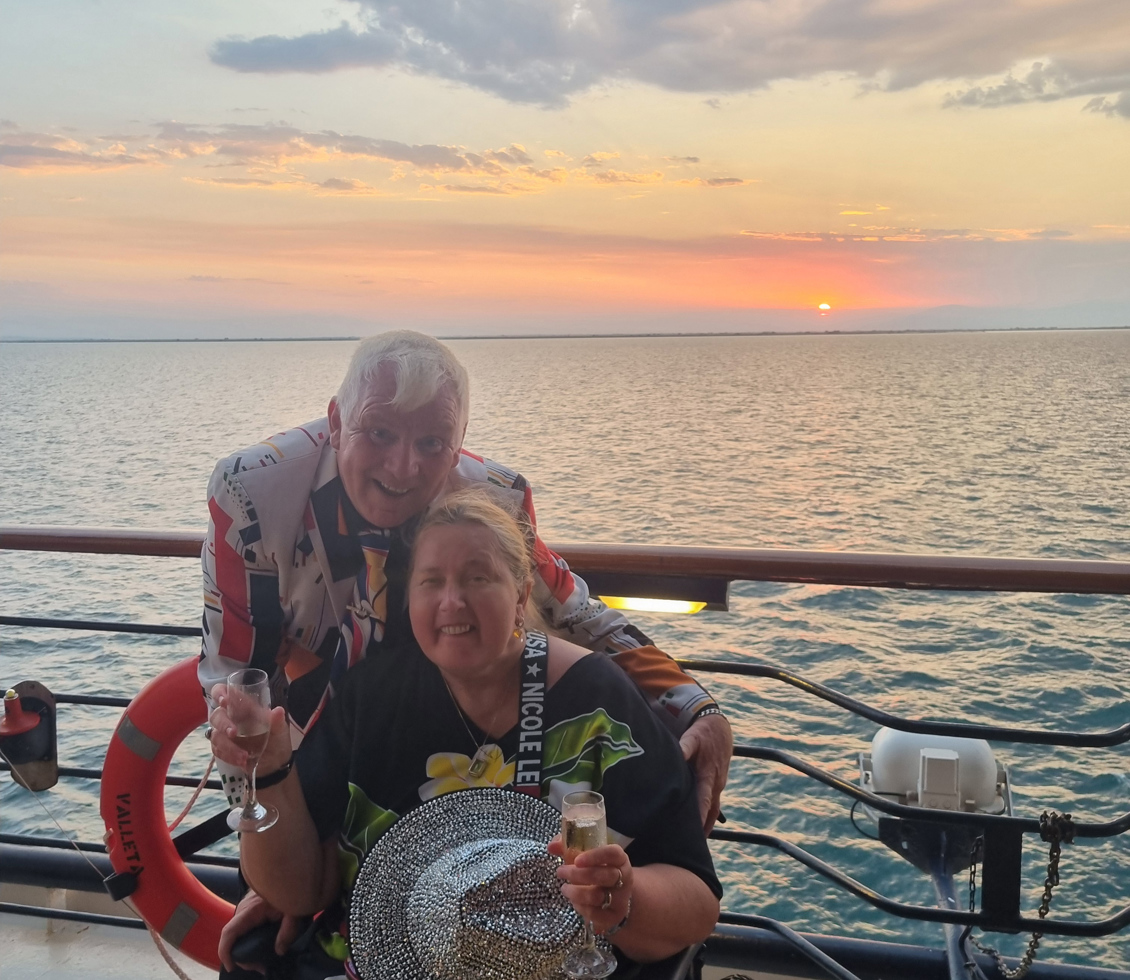 Couple on deck at sea